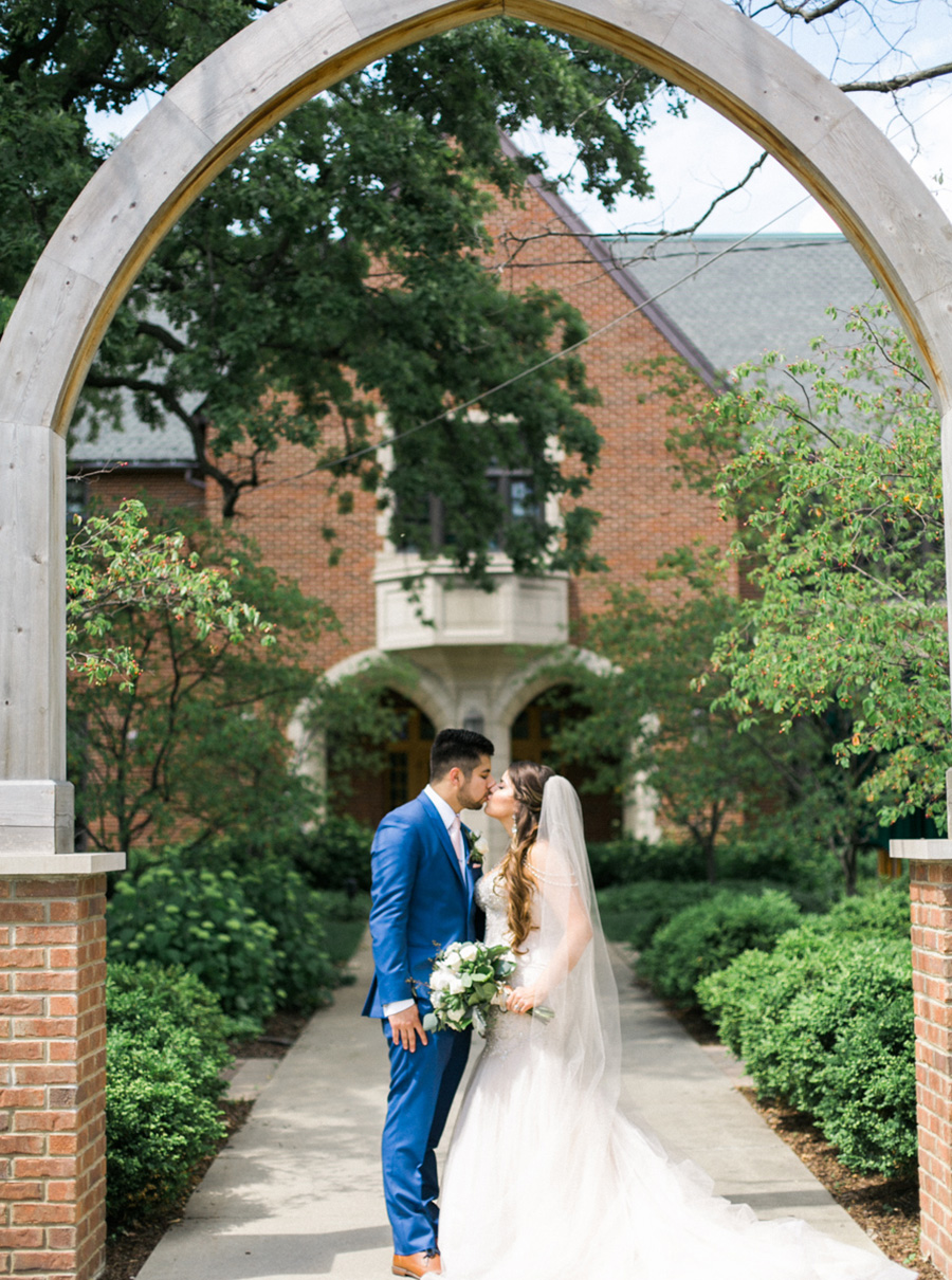 bride and groom at winnetka community house, chic industrial chicago, IL wedding at winnetka community house and ignite glass studios, blush pink and gold colors, photo by Laurelyn Savannah Photography - 36