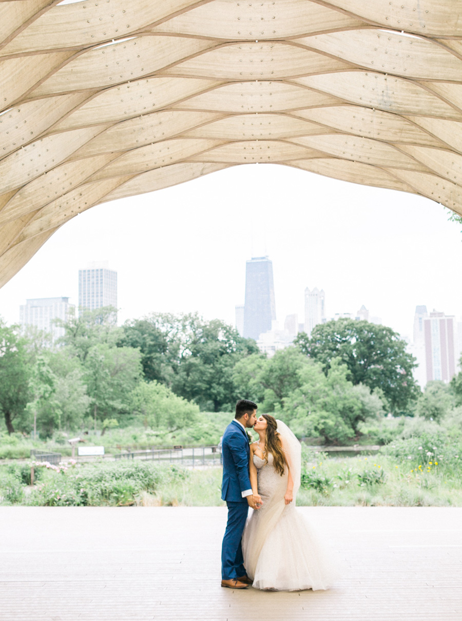bride and groom at honeycomb, chic industrial chicago, IL wedding at winnetka community house and ignite glass studios, blush pink and gold colors, photo by Laurelyn Savannah Photography - 44
