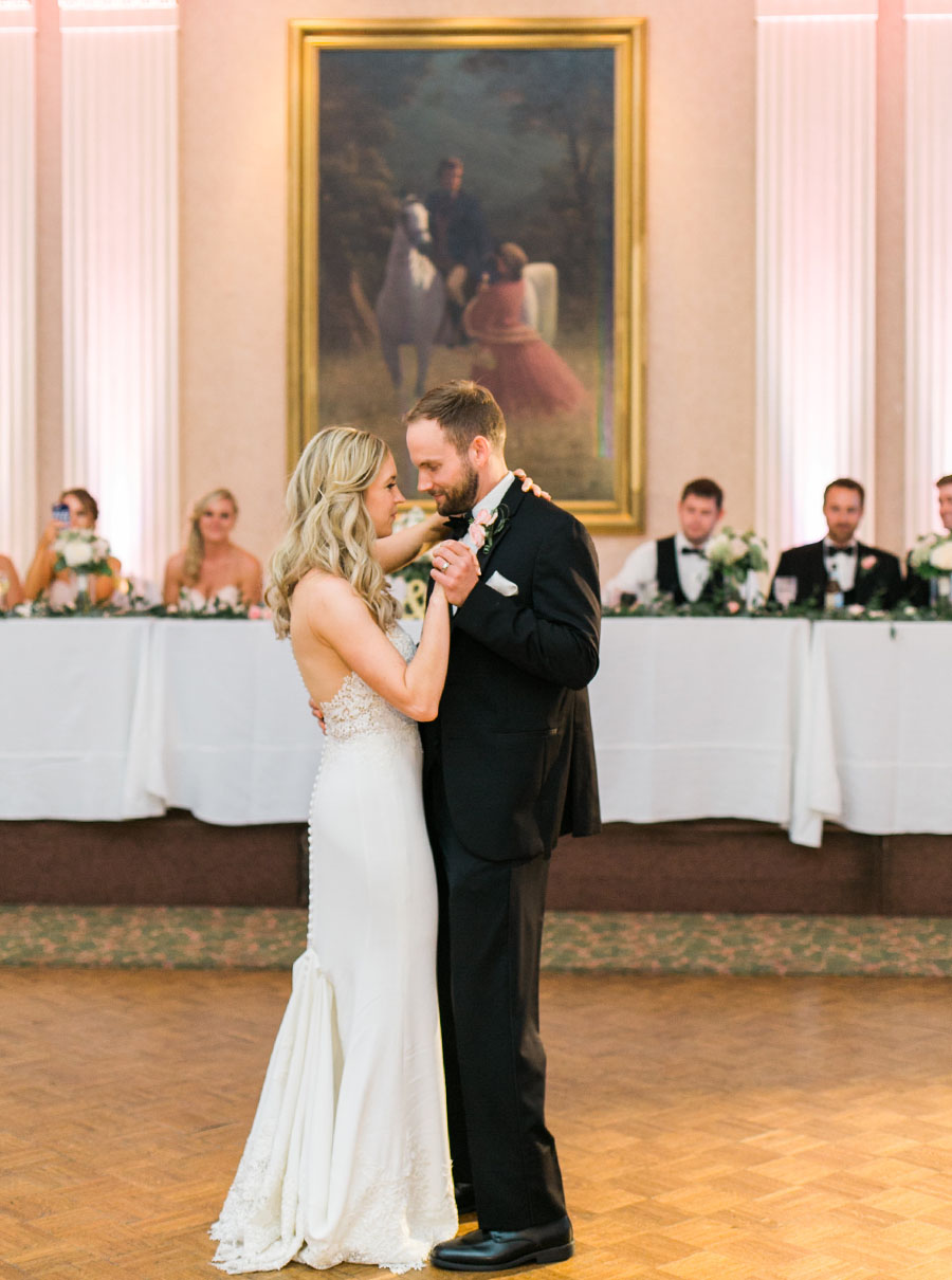 bride and groom first dance at milwaukee athletic club elegant classic wedding, blush bridesmaids and belle fiori flowers, romantic summer wedding, photo by laurelyn savannah photography 3