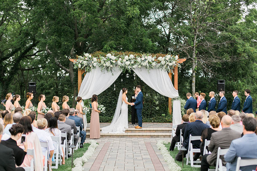 outdoor ceremony, romantic and organic wedding at the ridge hotel in lake geneva, wisconsin, with elegant neutral colors, photo by laurelyn savannah photography 34