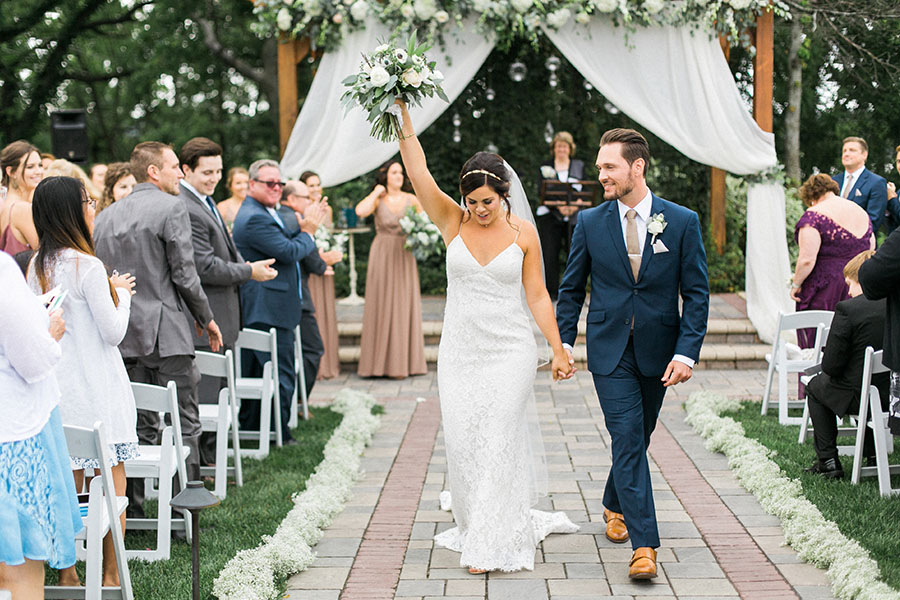 ceremony exit, romantic and organic wedding at the ridge hotel in lake geneva, wisconsin, with elegant neutral colors, photo by laurelyn savannah photography 36