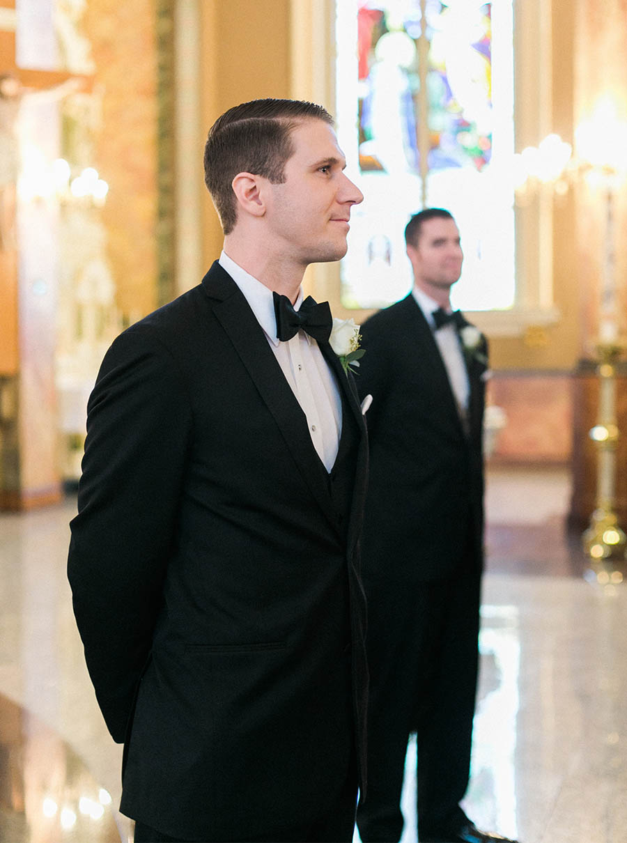groom's reaction, romantic and modern wedding at the basilica of st josaphat and milwaukee county historical society, wisconsin, elegant neutral white ivory colors, photo by laurelyn savannah photography 15