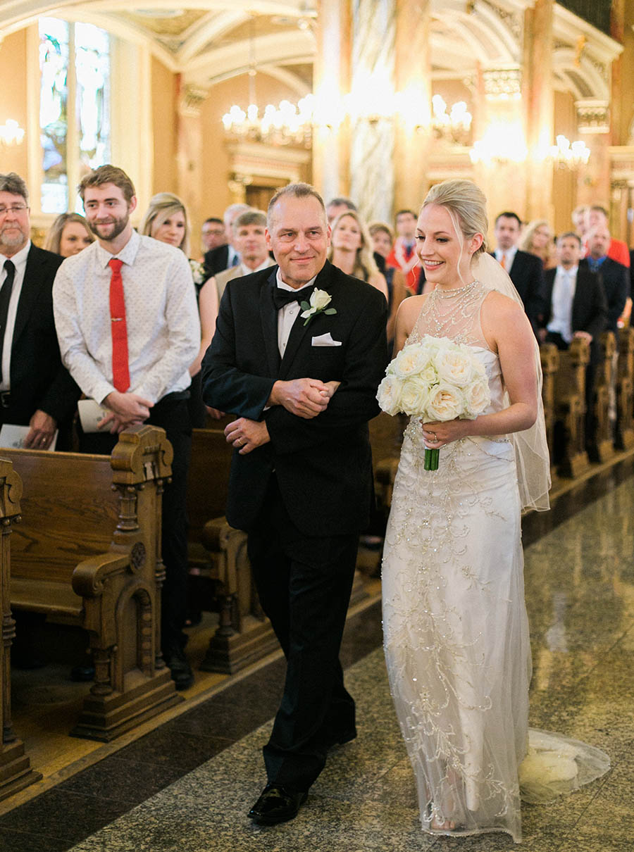 bride walking down the aisle, romantic and modern wedding at the basilica of st josaphat and milwaukee county historical society, wisconsin, elegant neutral white ivory colors, photo by laurelyn savannah photography 16
