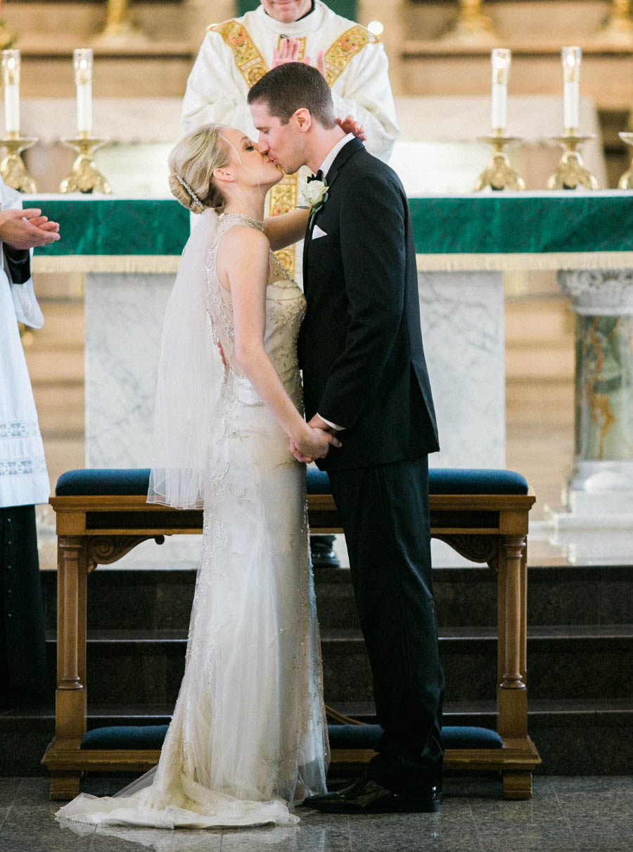 first kiss, romantic and modern wedding at the basilica of st josaphat and milwaukee county historical society, wisconsin, elegant neutral white ivory colors, photo by laurelyn savannah photography 22
