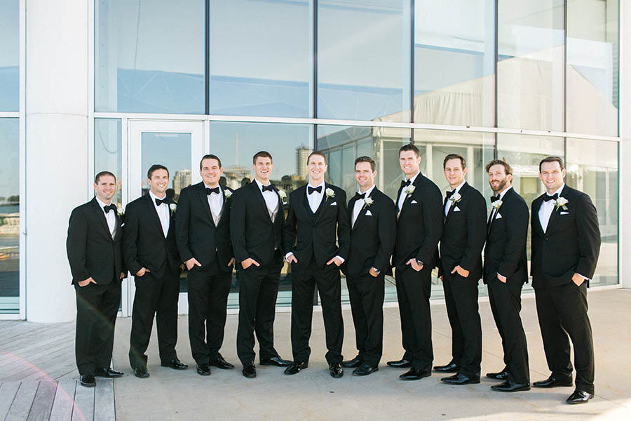 groomsmen photos lakefront discovery world, romantic and modern wedding at the basilica of st josaphat and milwaukee county historical society, wisconsin, elegant neutral white ivory colors, photo by laurelyn savannah photography 28