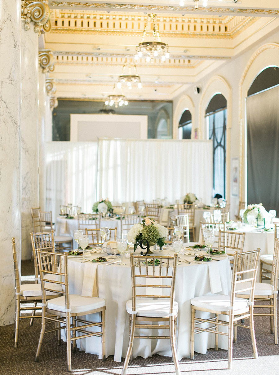 reception table gold chiavari chairs, romantic and modern wedding at the basilica of st josaphat and milwaukee county historical society, wisconsin, elegant neutral white ivory colors, photo by laurelyn savannah photography 33