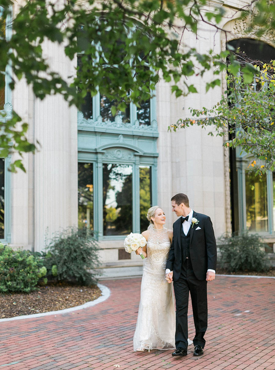 newlywed bride and groom portrait, romantic and modern wedding at the basilica of st josaphat and milwaukee county historical society, wisconsin, elegant neutral white ivory colors, photo by laurelyn savannah photography 34