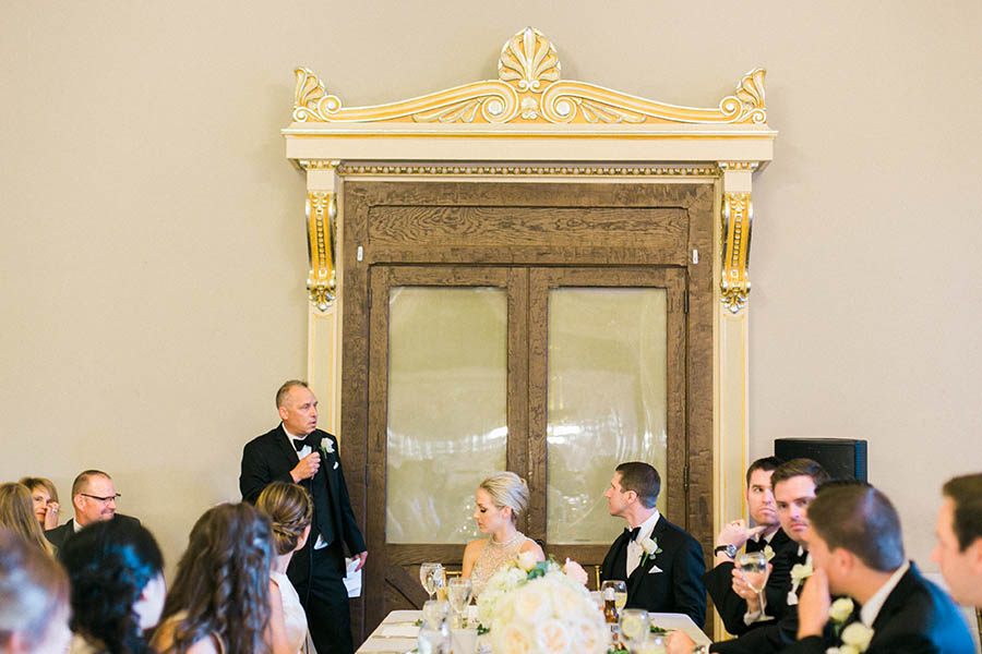 reception toast speech, romantic and modern wedding at the basilica of st josaphat and milwaukee county historical society, wisconsin, elegant neutral white ivory colors, photo by laurelyn savannah photography 41