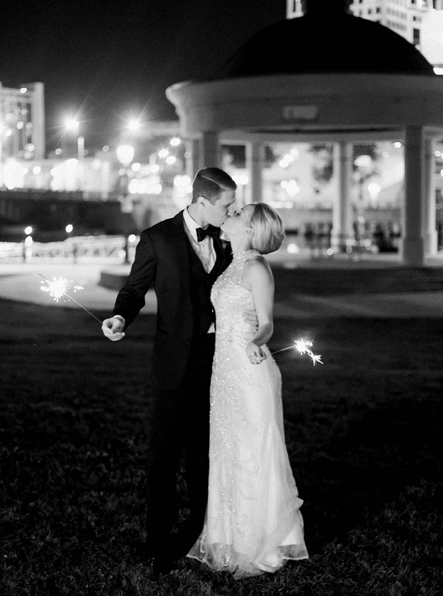 sparkler exit bride and groom portrait, romantic and modern wedding at the basilica of st josaphat and milwaukee county historical society, wisconsin, elegant neutral white ivory colors, photo by laurelyn savannah photography 49