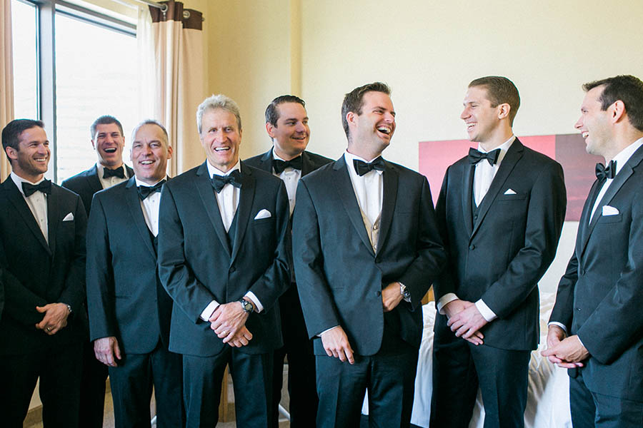 groomsmen getting ready, romantic and modern wedding at the basilica of st josaphat and milwaukee county historical society, wisconsin, elegant neutral white ivory colors, photo by laurelyn savannah photography 9
