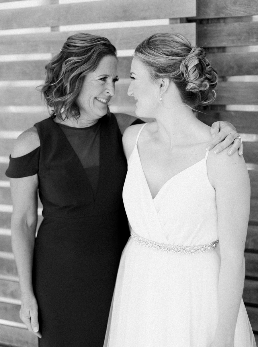 bride and mom, Blue Watercolor-Inspired, elegant downtown modern wedding along the Milwaukee River in Wisconsin, photo by Laurelyn Savannah Photography 7