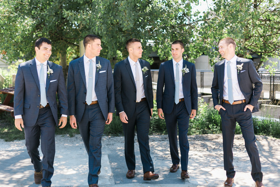groom getting ready, Blue Watercolor-Inspired, elegant downtown modern wedding along the Milwaukee River in Wisconsin, photo by Laurelyn Savannah Photography 10