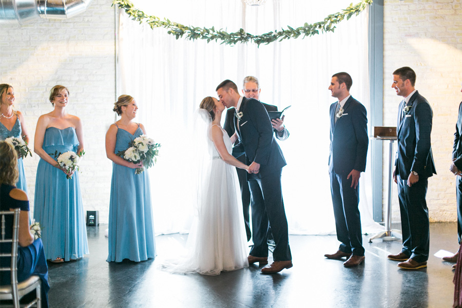 ceremony, Blue Watercolor-Inspired, elegant downtown modern wedding along the Milwaukee River in Wisconsin, photo by Laurelyn Savannah Photography 25