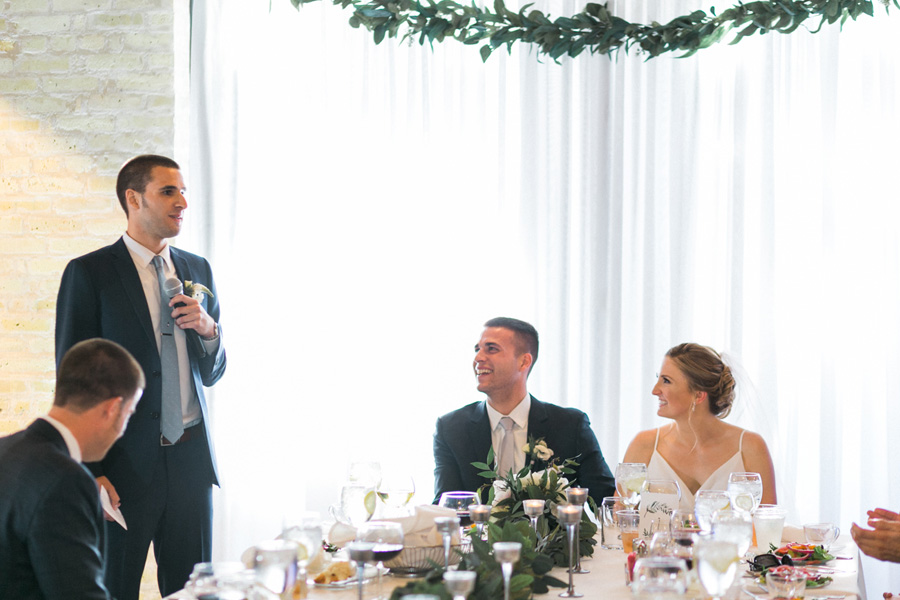 best man speech toast, Blue Watercolor-Inspired, elegant downtown modern wedding along the Milwaukee River in Wisconsin, photo by Laurelyn Savannah Photography 39