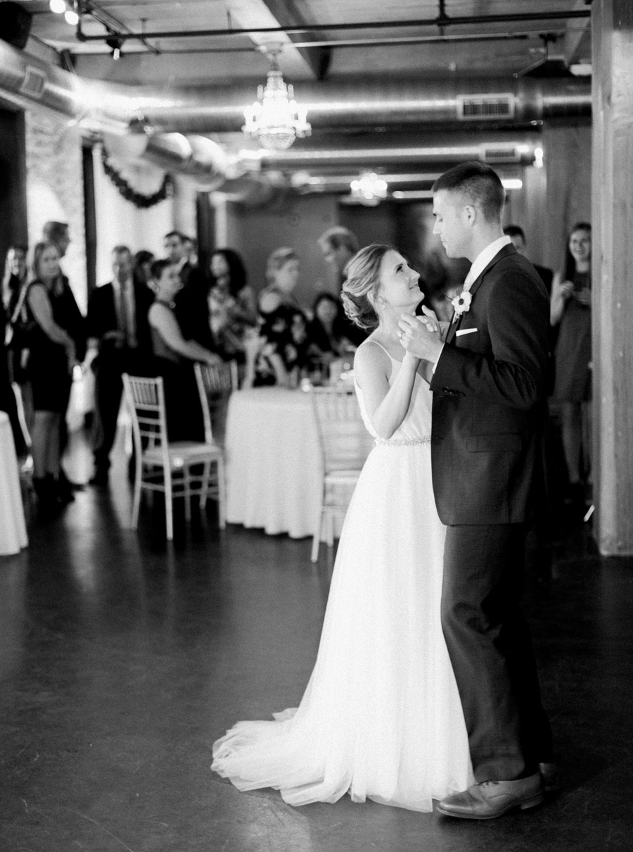 first dance, Blue Watercolor-Inspired, elegant downtown modern wedding along the Milwaukee River in Wisconsin, photo by Laurelyn Savannah Photography 41