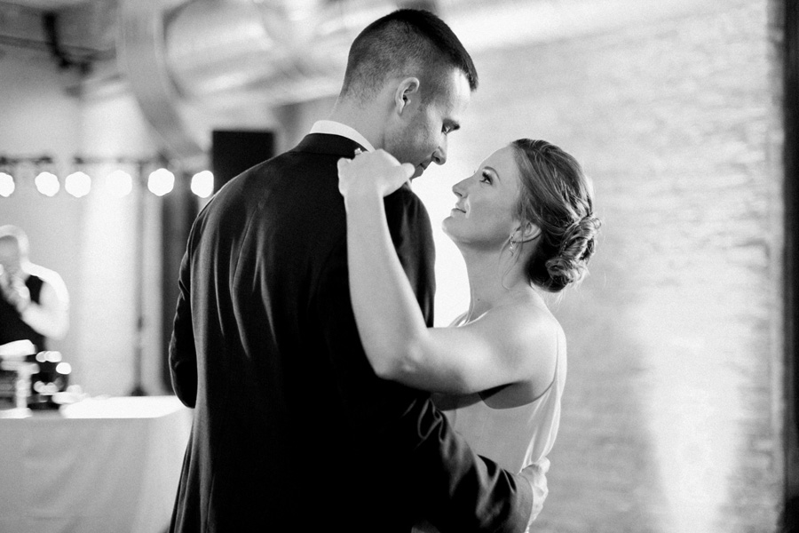 first dance, Blue Watercolor-Inspired, elegant downtown modern wedding along the Milwaukee River in Wisconsin, photo by Laurelyn Savannah Photography 42