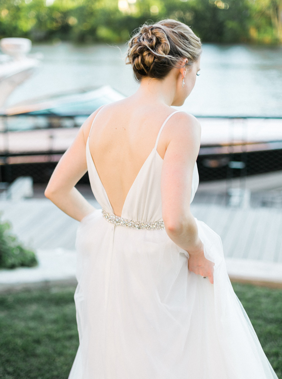 bride and groom sunset portrait, Blue Watercolor-Inspired, elegant downtown modern wedding along the Milwaukee River in Wisconsin, photo by Laurelyn Savannah Photography 48