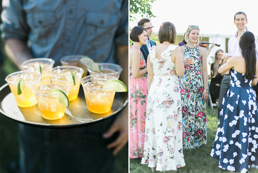 cocktail hour, outdoor tented private estate wedding in a field in wisconsin, gold and blue colors, photo by laurelyn savannah photography 26