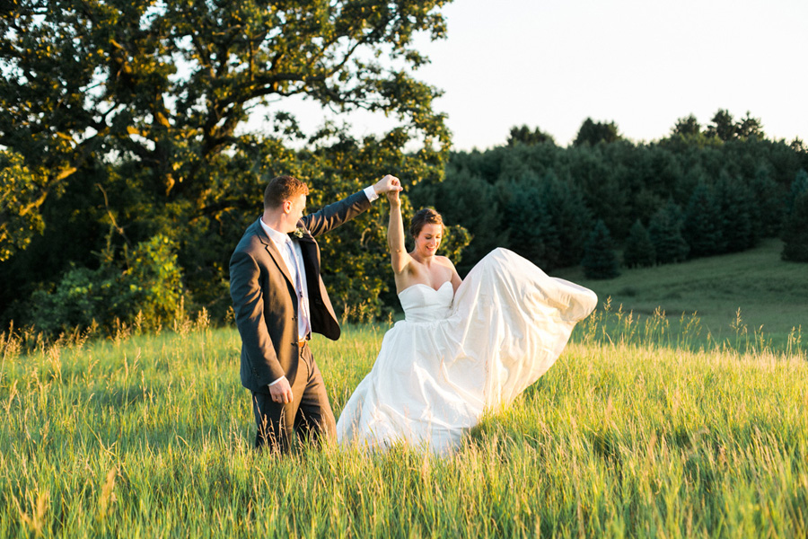 bride and groom sunset portraits, outdoor tented private estate wedding in a field in wisconsin, gold and blue colors, photo by laurelyn savannah photography 39