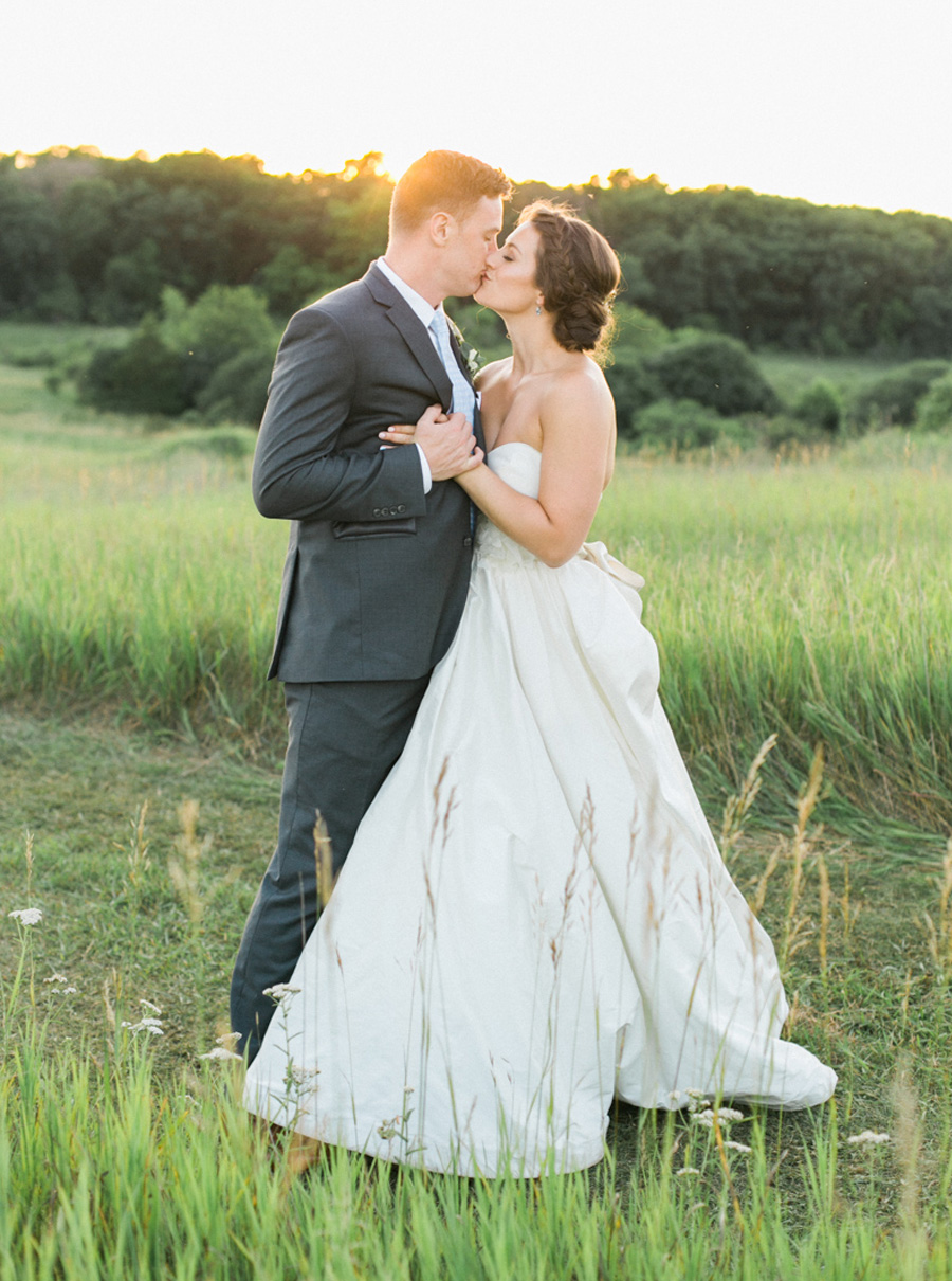 bride and groom sunset portraits, outdoor tented private estate wedding in a field in wisconsin, gold and blue colors, photo by laurelyn savannah photography 46