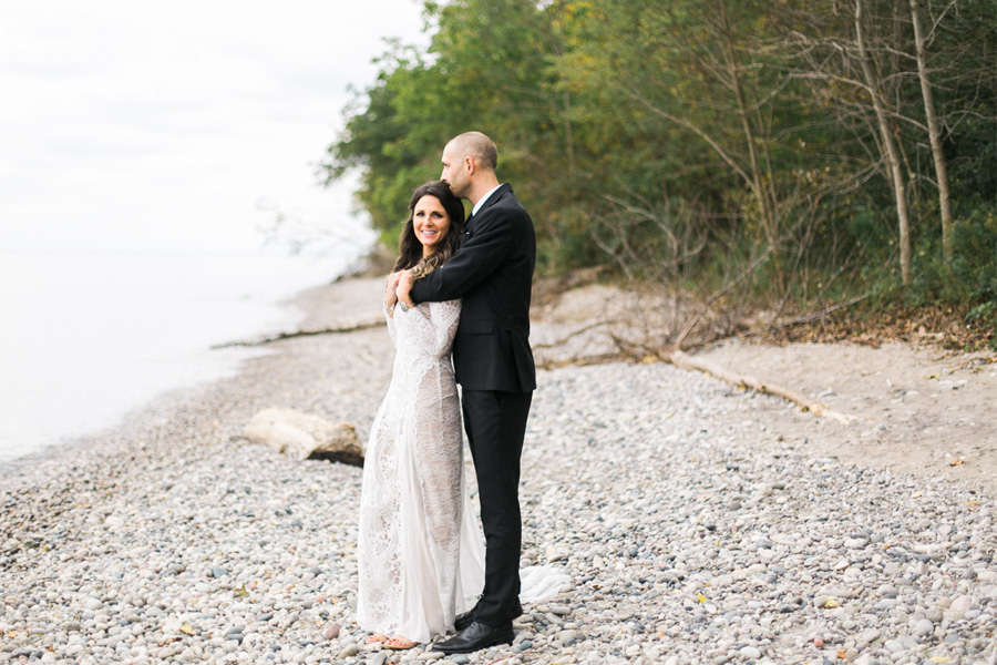 bride and groom portrait at a boho outdoor wedding at Schlitz Audubon Nature Center in Milwaukee, Wisconsin, photo by Laurelyn Savannah Photography 17
