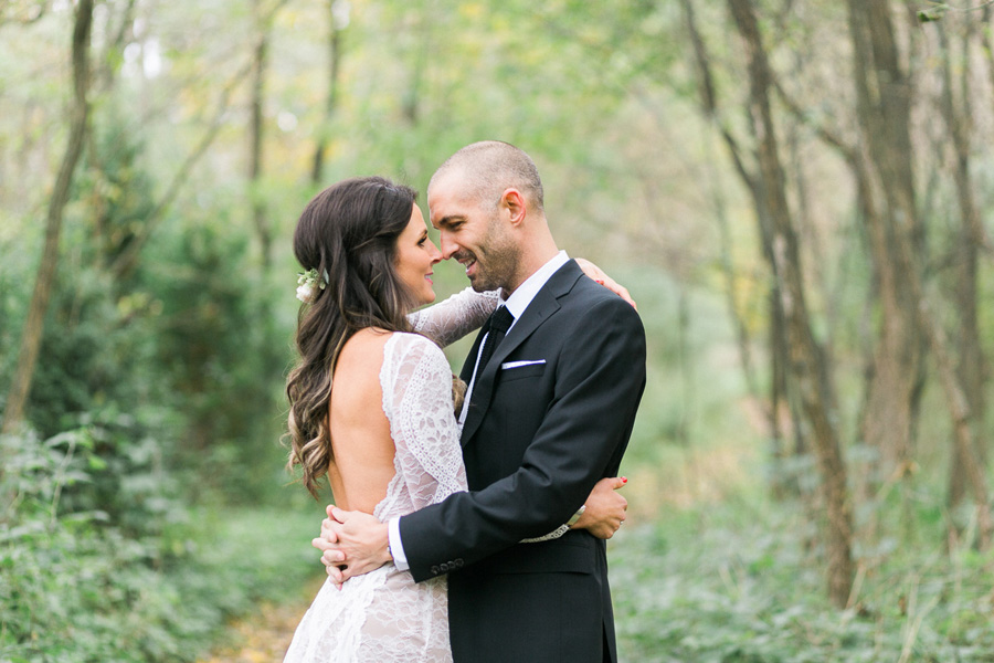 bride and groom portrait at a boho outdoor wedding at Schlitz Audubon Nature Center in Milwaukee, Wisconsin, photo by Laurelyn Savannah Photography 28