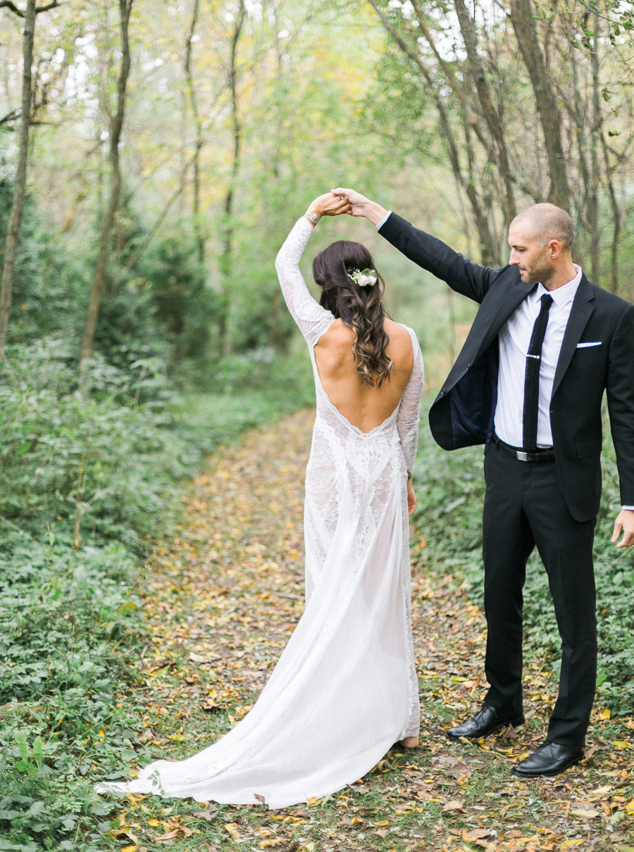 bride and groom portrait at a boho outdoor wedding at Schlitz Audubon Nature Center in Milwaukee, Wisconsin, photo by Laurelyn Savannah Photography 33
