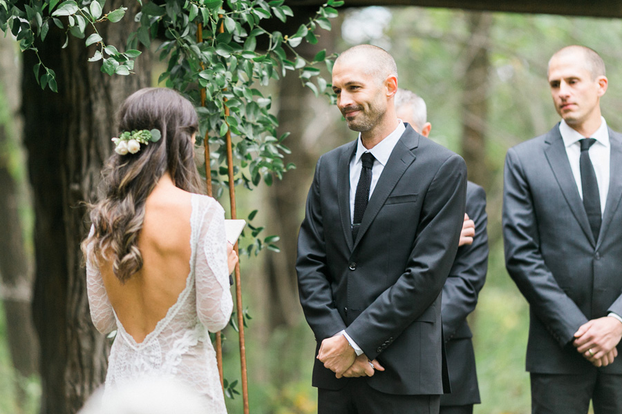 ceremony at a boho outdoor wedding at Schlitz Audubon Nature Center in Milwaukee, Wisconsin, photo by Laurelyn Savannah Photography 51
