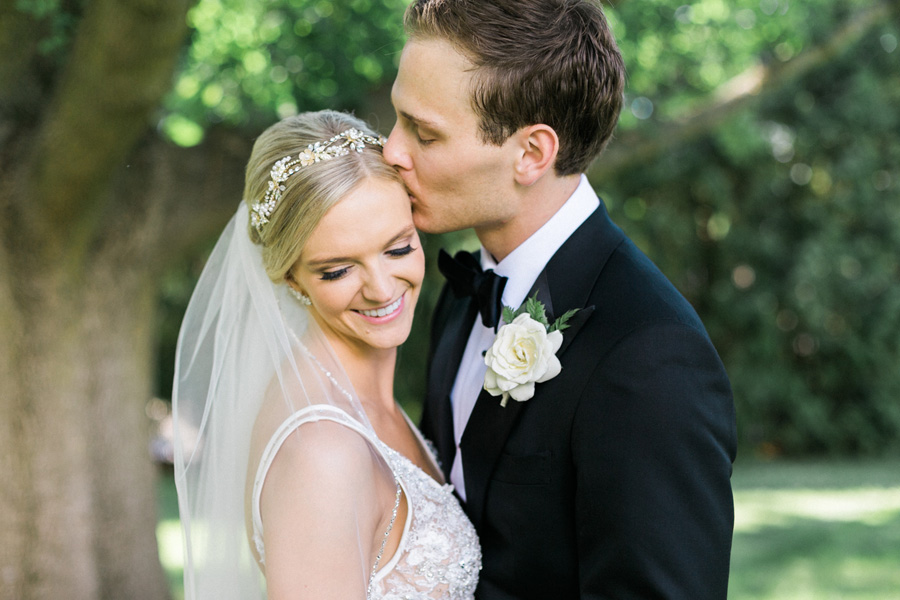 bride and groom portraits, classic and romantic gold wedding in downtown Green Bay, Wisconsin, photo by Laurelyn Savannah Photography