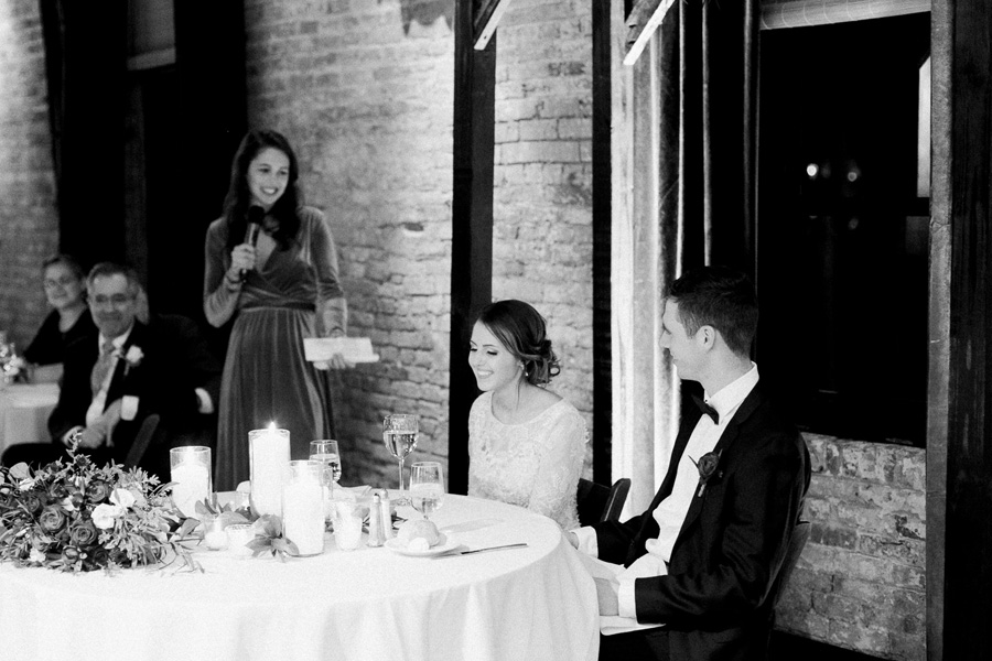 reception speech toast, classic, romantic gold and burgundy red winter wedding at cuvee in downtown Milwaukee, Wisconsin, photo by Laurelyn Savannah Photography