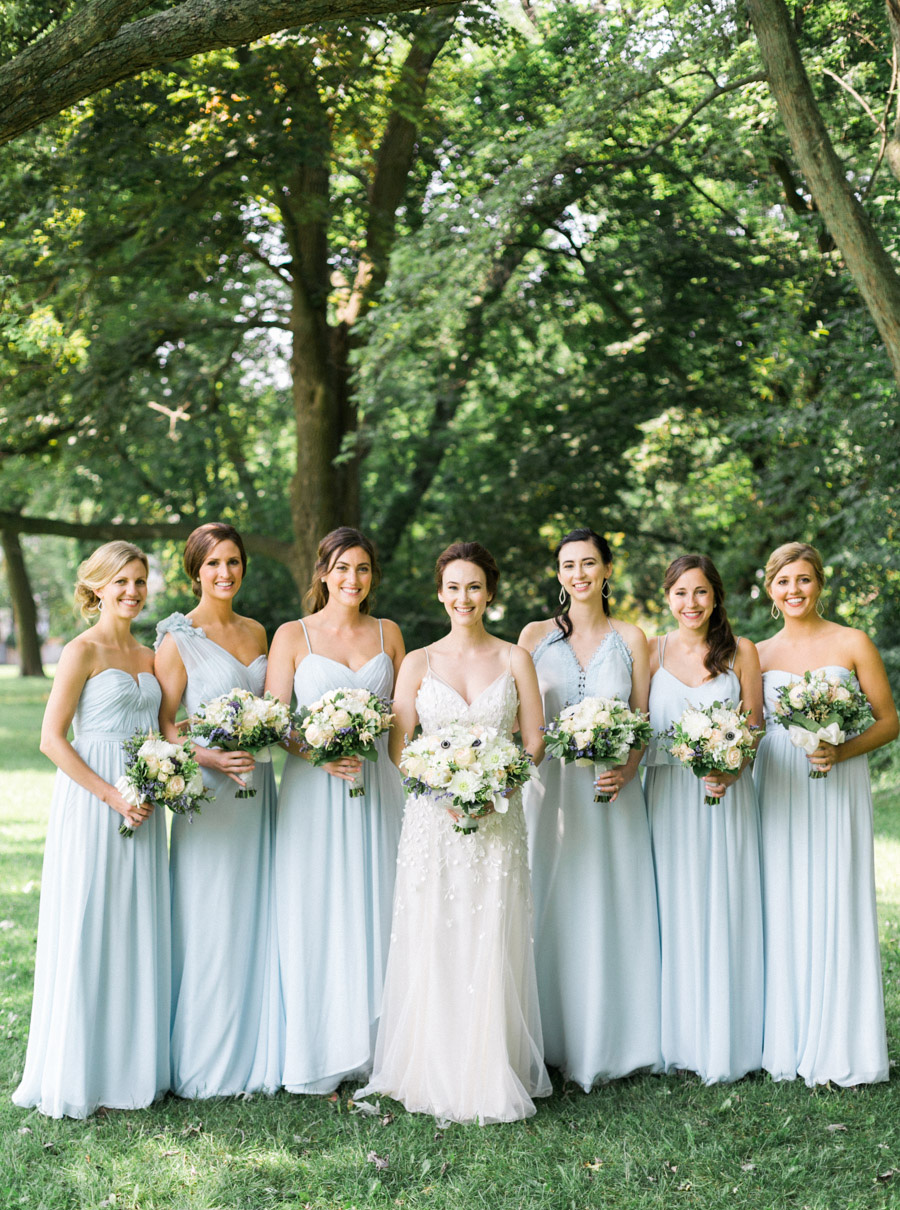 bride and blue bridesmaid photos in Lake Park, elegant and modern lakefront wedding in downtown Milwaukee, Wisconsin with NYC flair, photo by Laurelyn Savannah Photography