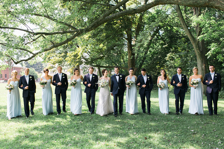 bride and blue bridal party photos in Lake Park, elegant and modern lakefront wedding in downtown Milwaukee, Wisconsin with NYC flair, photo by Laurelyn Savannah Photography