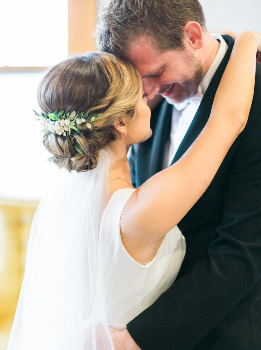 bride and groom portrait, elegant green and gold fall wedding at Historic Courthouse 1893 in Waukesha Milwaukee, Wisconsin, photo by Laurelyn Savannah Photography