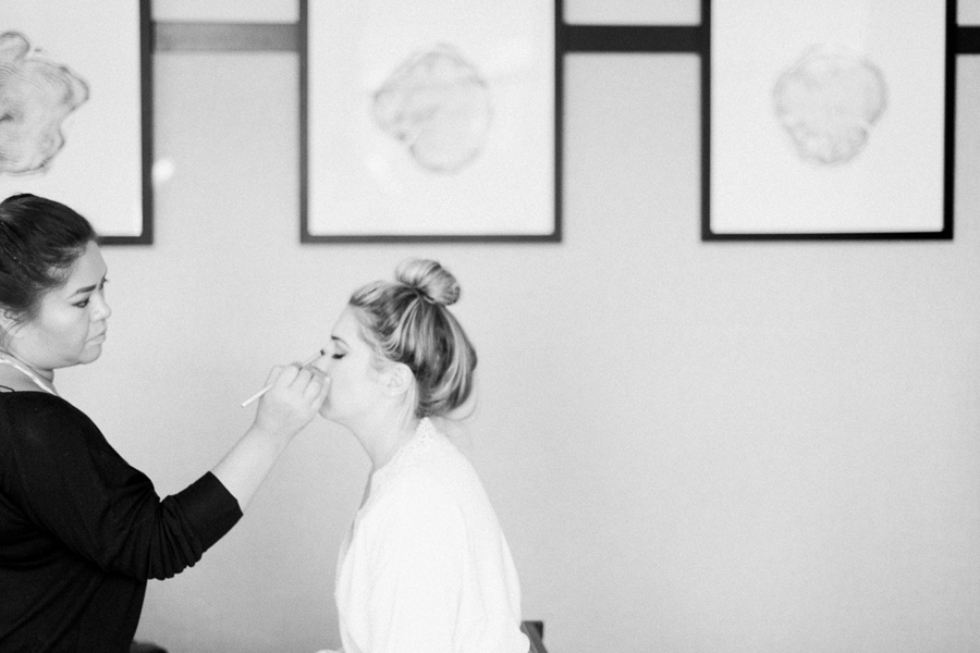 bride getting ready, glamping and chic safari romantic outdoor wedding at Milwaukee County Zoo, Wisconsin, photo by Laurelyn Savannah Photography
