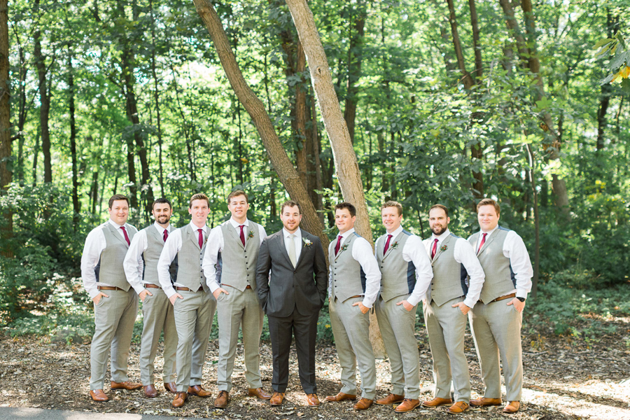 groom and groomsmen portrait, glamping and chic safari romantic outdoor wedding at Milwaukee County Zoo, Wisconsin, photo by Laurelyn Savannah Photography