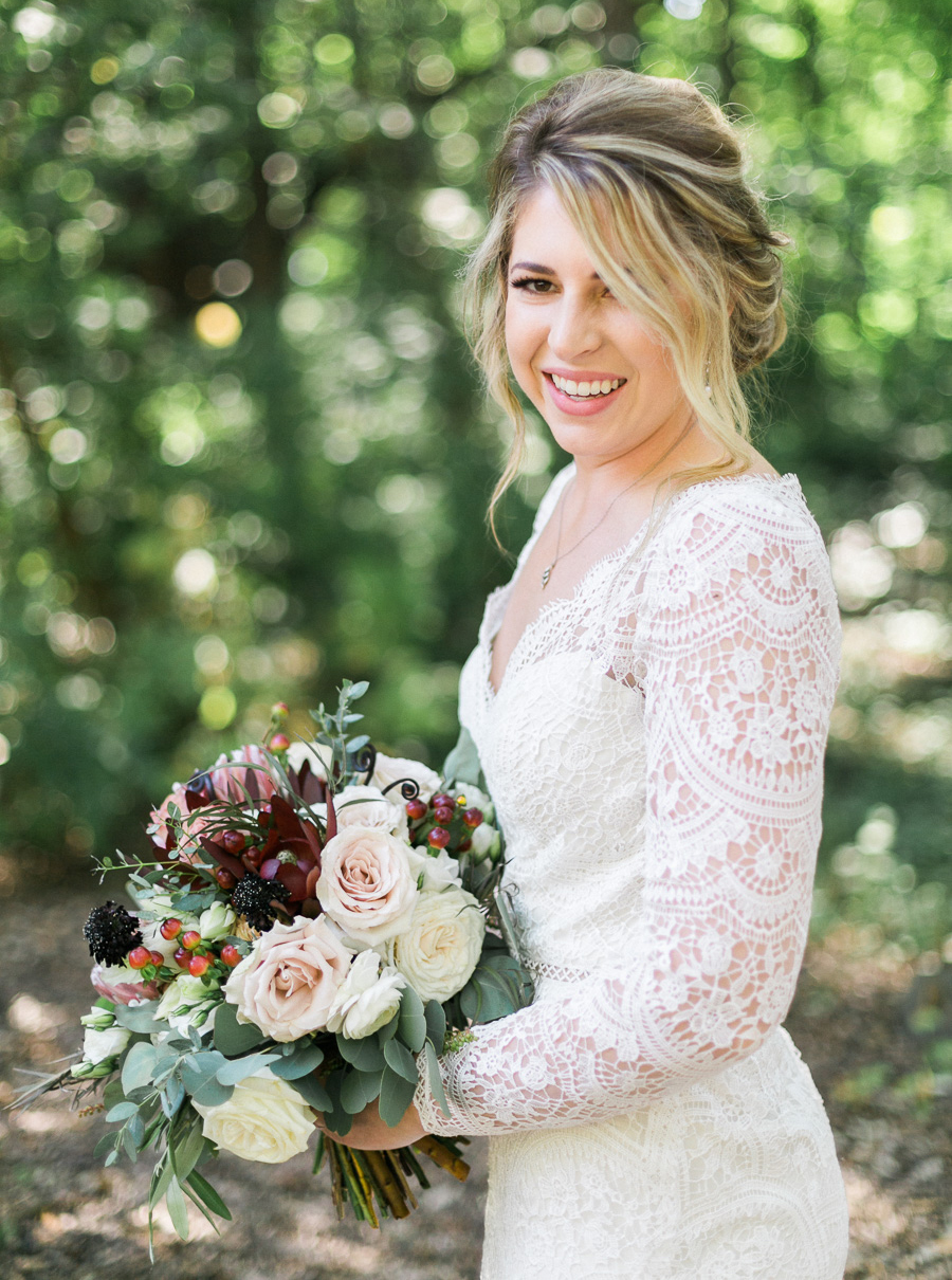 bridal portrait, glamping and chic safari romantic outdoor wedding at Milwaukee County Zoo, Wisconsin, photo by Laurelyn Savannah Photography