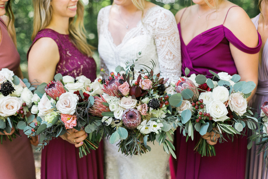 bride and bridesmaids portrait, glamping and chic safari romantic outdoor wedding at Milwaukee County Zoo, Wisconsin, photo by Laurelyn Savannah Photography