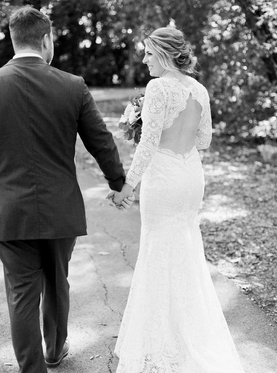 bride and groom portrait, glamping and chic safari romantic outdoor wedding at Milwaukee County Zoo, Wisconsin, photo by Laurelyn Savannah Photography