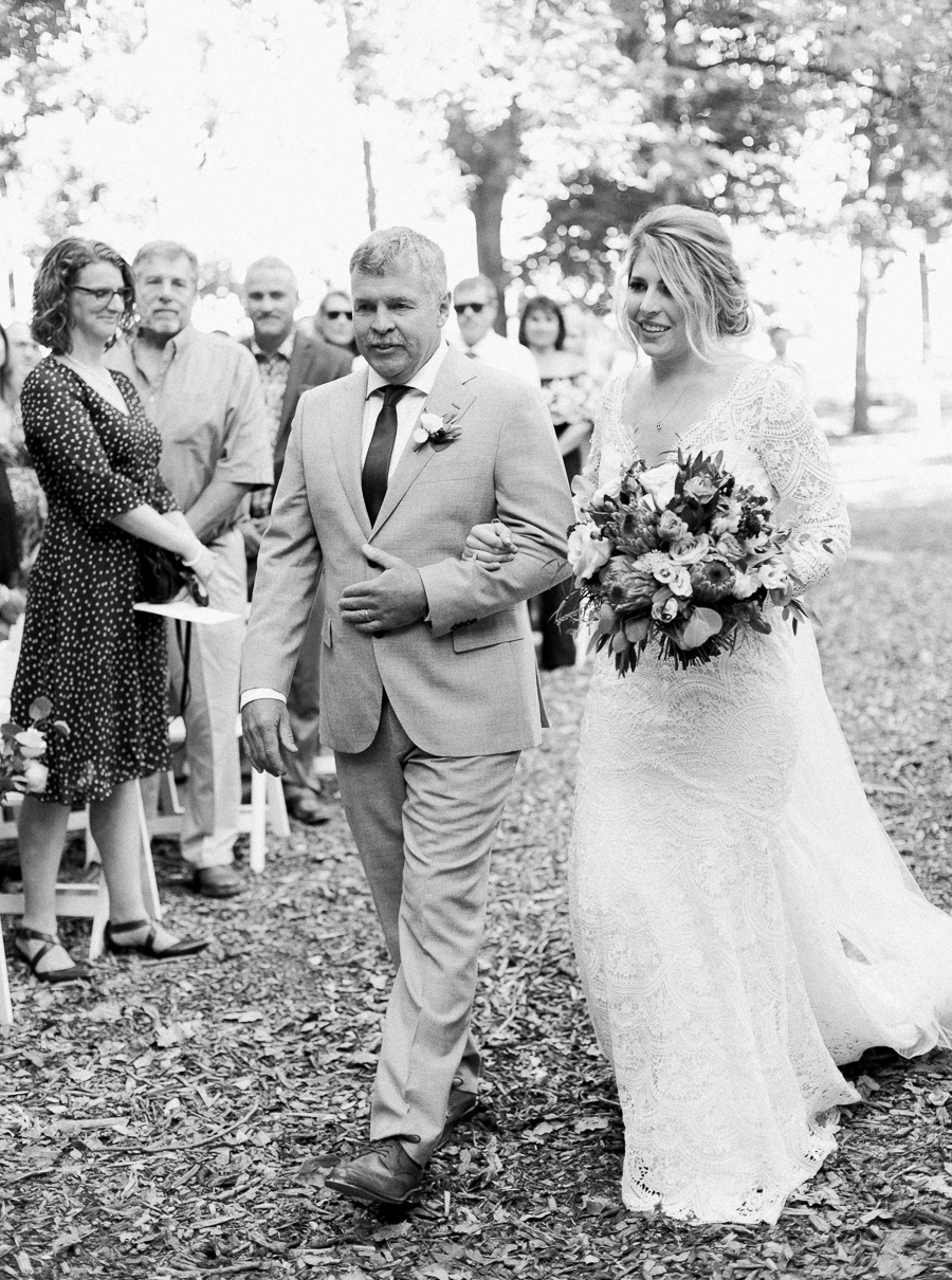 outdoor ceremony, glamping and chic safari romantic outdoor wedding at Milwaukee County Zoo, Wisconsin, photo by Laurelyn Savannah Photography