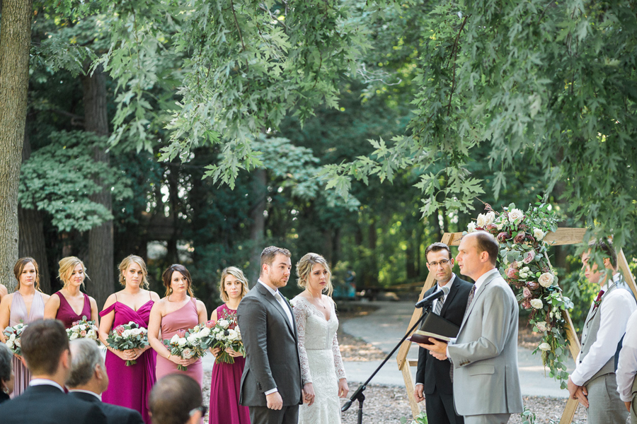 outdoor ceremony, glamping and chic safari romantic outdoor wedding at Milwaukee County Zoo, Wisconsin, photo by Laurelyn Savannah Photography