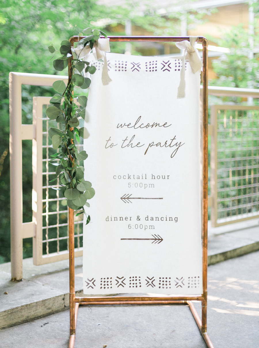 signage on canvas linen, glamping and chic safari romantic outdoor wedding at Milwaukee County Zoo, Wisconsin, photo by Laurelyn Savannah Photography