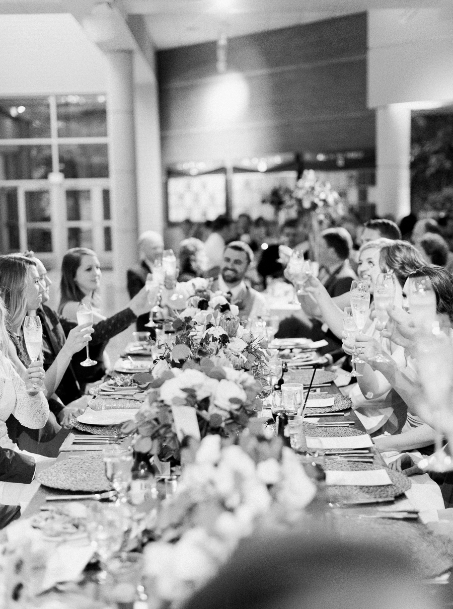 reception toast speech, glamping and chic safari romantic outdoor wedding at Milwaukee County Zoo, Wisconsin, photo by Laurelyn Savannah Photography