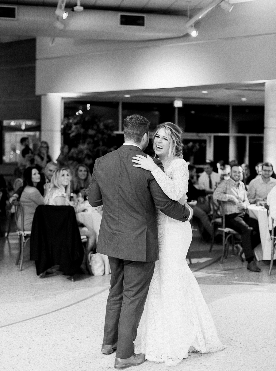 reception first dance, glamping and chic safari romantic outdoor wedding at Milwaukee County Zoo, Wisconsin, photo by Laurelyn Savannah Photography
