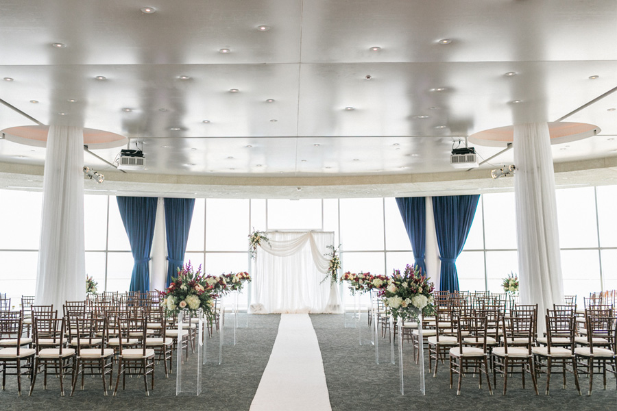 ceremony decor, romantic navy and gold and burgundy red fall wedding at Discovery World in downtown Milwaukee, Wisconsin, photo by Laurelyn Savannah Photography
