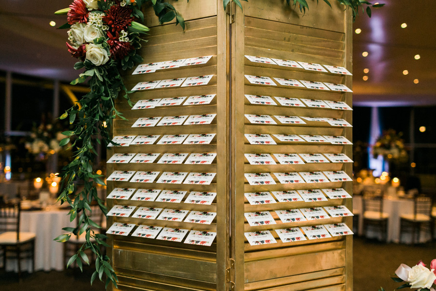 reception place cards, romantic navy and gold and burgundy red fall wedding at Discovery World in downtown Milwaukee, Wisconsin, photo by Laurelyn Savannah Photography