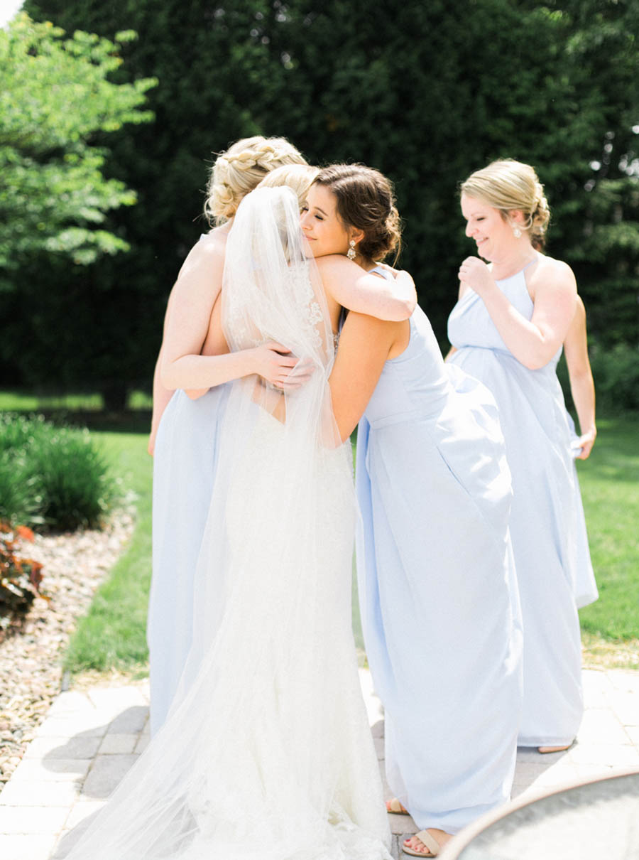 bride and bridesmaids getting ready, classic, elegant and romantic blue and white wedding in downtown Madison, Wisconsin, and Blackhawk Country Club, photo by Laurelyn Savannah Photography