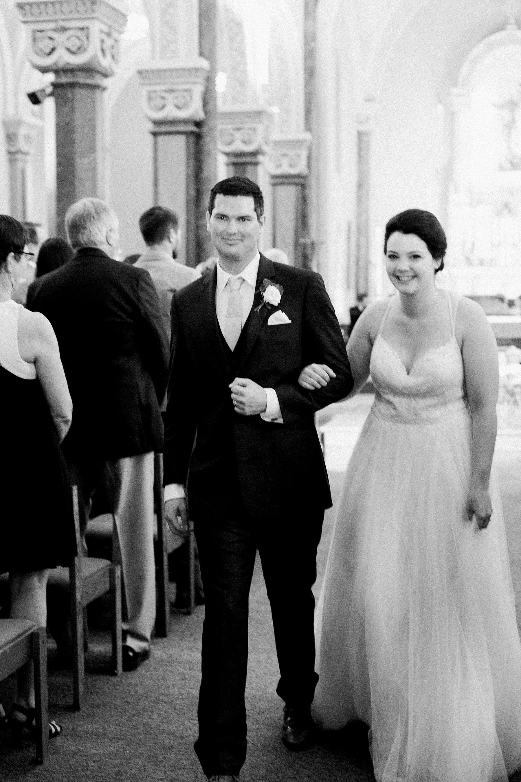 ceremony exit, romantic wedding at turner hall ballroom downtown milwaukee with milwaukee flower company, photo by laurelyn savannah photography