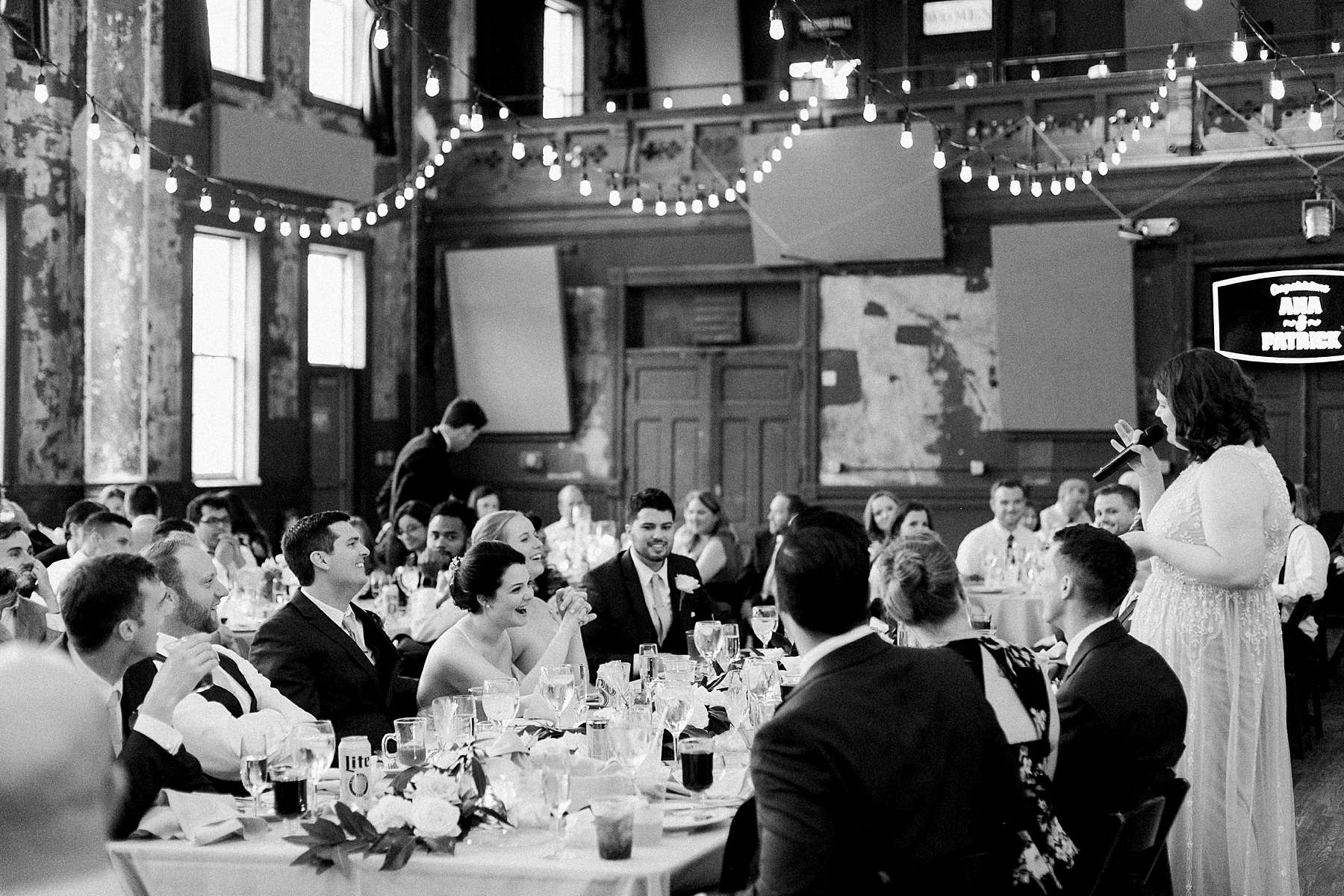 reception toasts, romantic wedding at turner hall ballroom downtown milwaukee with milwaukee flower company, photo by laurelyn savannah photography