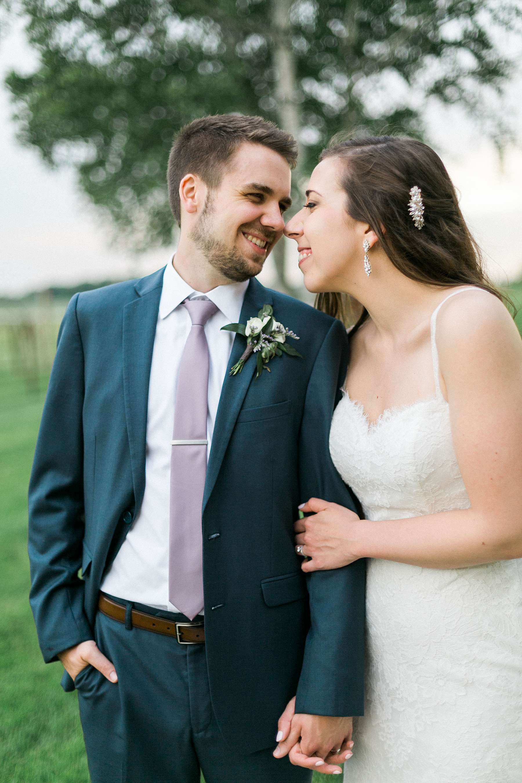 bride and groom portrait, rustic romantic wedding at over the vines with midwestern bride, photo by laurelyn savannah photography