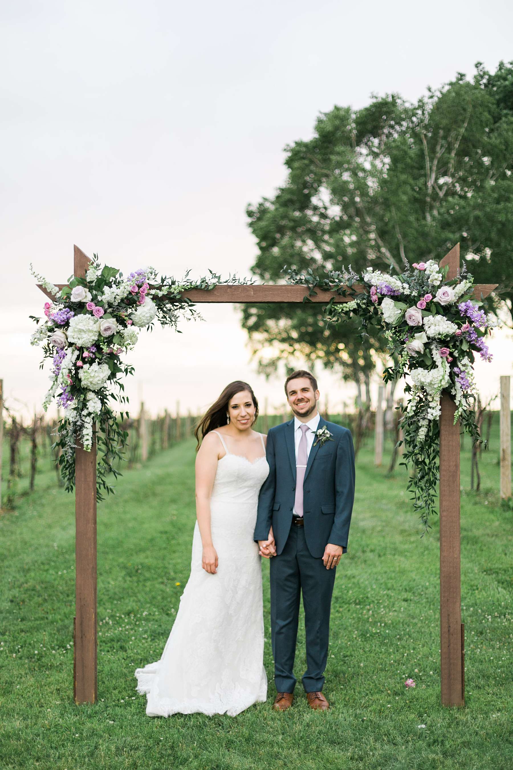 bride and groom portrait, rustic romantic wedding at over the vines with midwestern bride, photo by laurelyn savannah photography